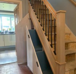Solid Oak handrail, baserail with metal spindles and MDF drawer and cupboard underneath: Click Here To View Larger Image