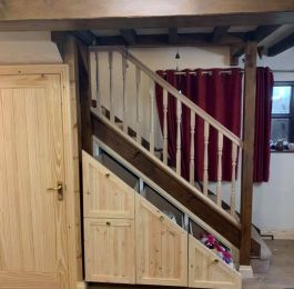 New spindles and handrail and under stairs storage in Hemlock: Click Here To View Larger Image